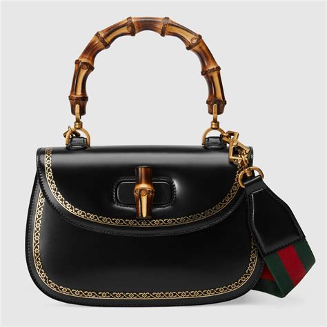 gucci shoulder bag top handle embossed|Gucci top handle bag vintage.